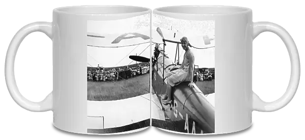 Amy Johnson with her De Havilland Gipsy Moth Jason