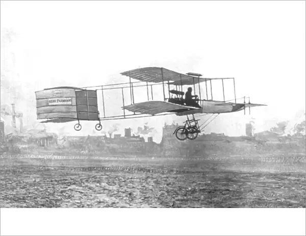 Henri Farman on his Voisin-Farman Biplane