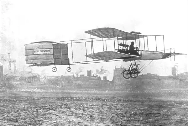 Henri Farman on his Voisin-Farman Biplane