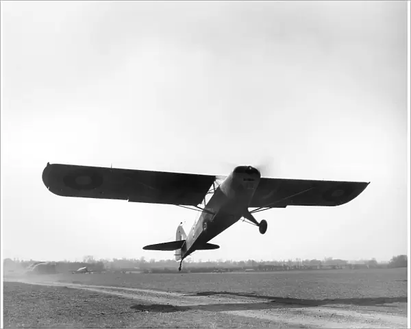 Auster IV. British Taylorcraft Auster IV (MT225) taking off, Rearsby, 1944