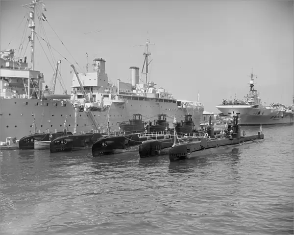 Submarines with their depot ship