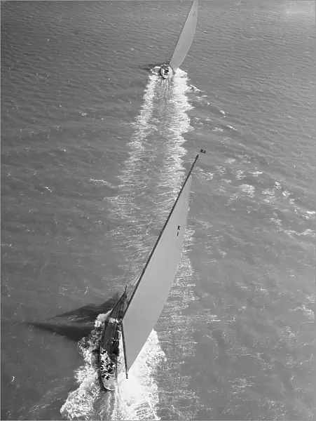 Britannia. A J Class yacht leads Britannia, Cowes 1934