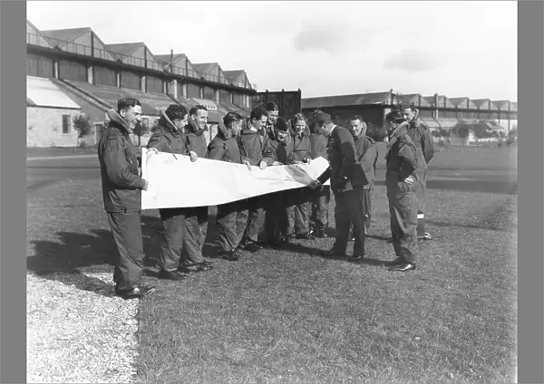 Airmen of Long Range Development Unit, with map, Upper Heyford, 1938