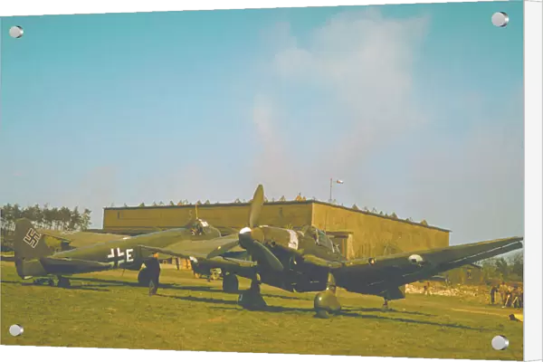 Junkers Ju 87D and Junkers Ju 88 on the captured German aerodrome of Langenhagen, 1945