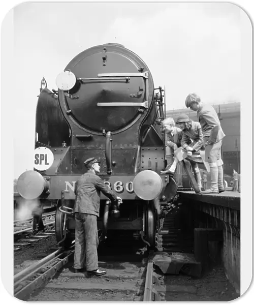 Three children and the engine driver