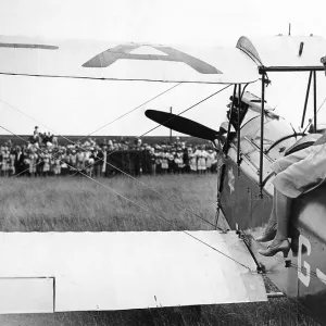 Amy Johnson with her De Havilland Gipsy Moth Jason