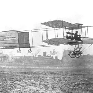 Henri Farman on his Voisin-Farman Biplane