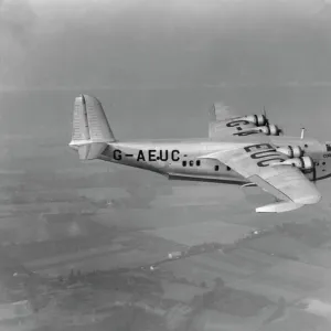 Short C- Class flying boat G-AEUC in flight, 1937