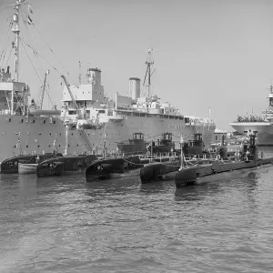 Submarines with their depot ship