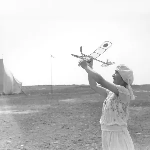 Woman with model aeroplane