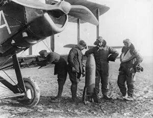 World War One Gallery: Aircrew of 27 Squadron examine a 230lb bomb
