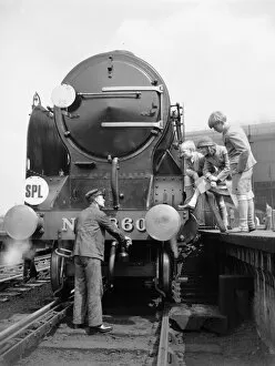 Railways Gallery: Three children and the engine driver