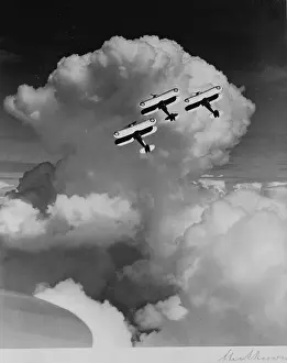 Three Gloster Gladiator aircraft perfoming aerobatics while tied together