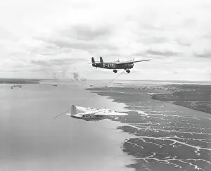 Handley Page Harrow about to refuel a Short C'Class flying boat