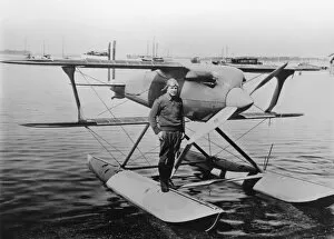 Record Breaking Gallery: James Doolittle on the float of his Curtiss R3C racer, 1925