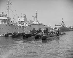 Postwar Gallery: Submarines with their depot ship